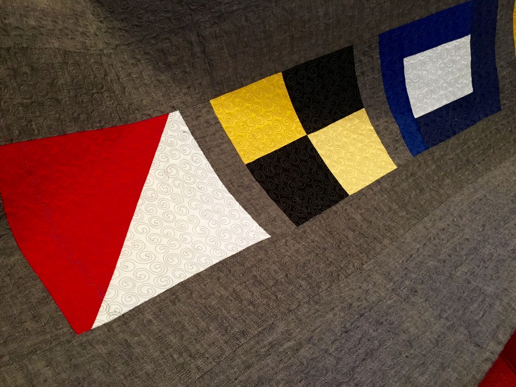 quilting detail, nautical flags